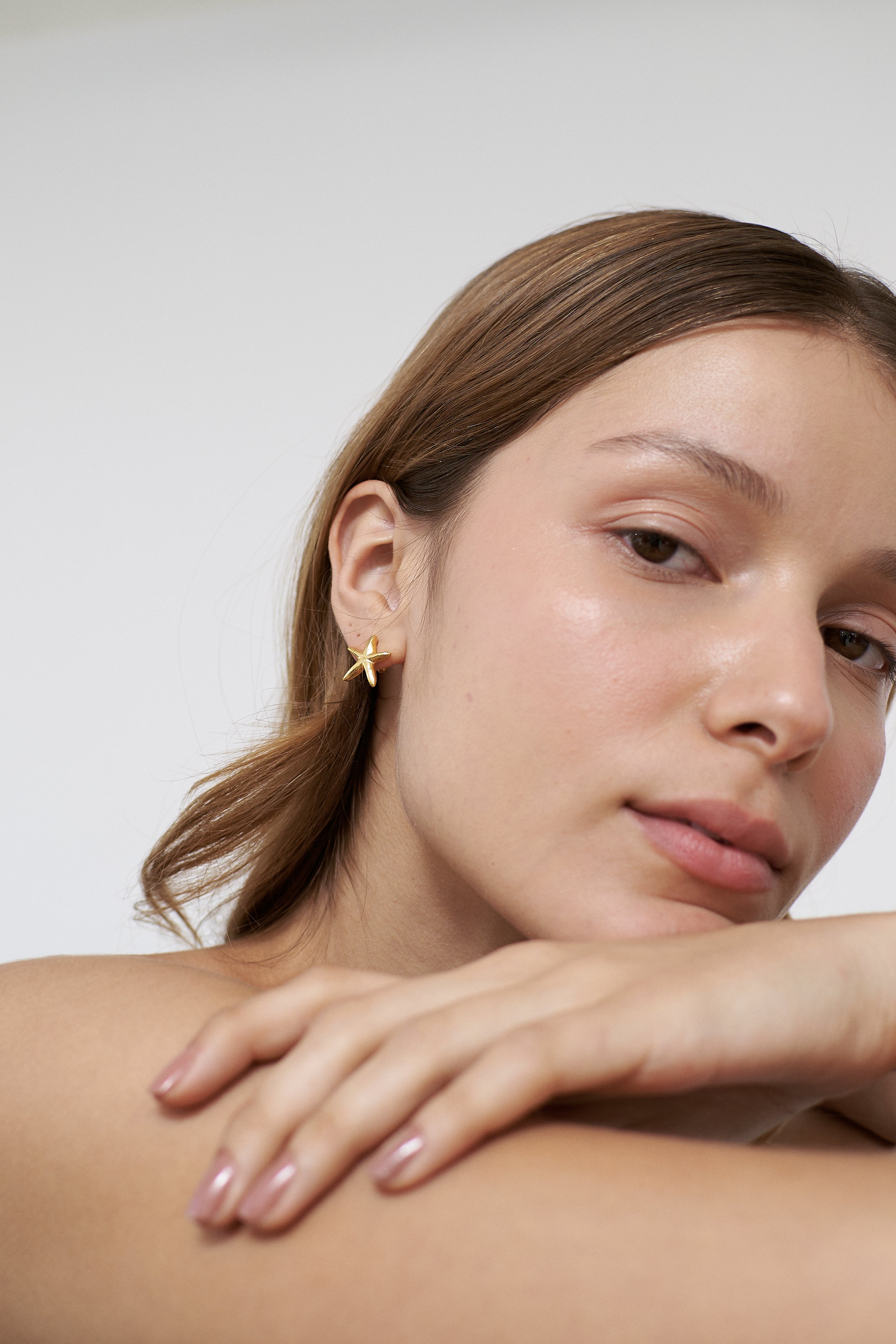 Aretes Una estrella de mar mini dorado