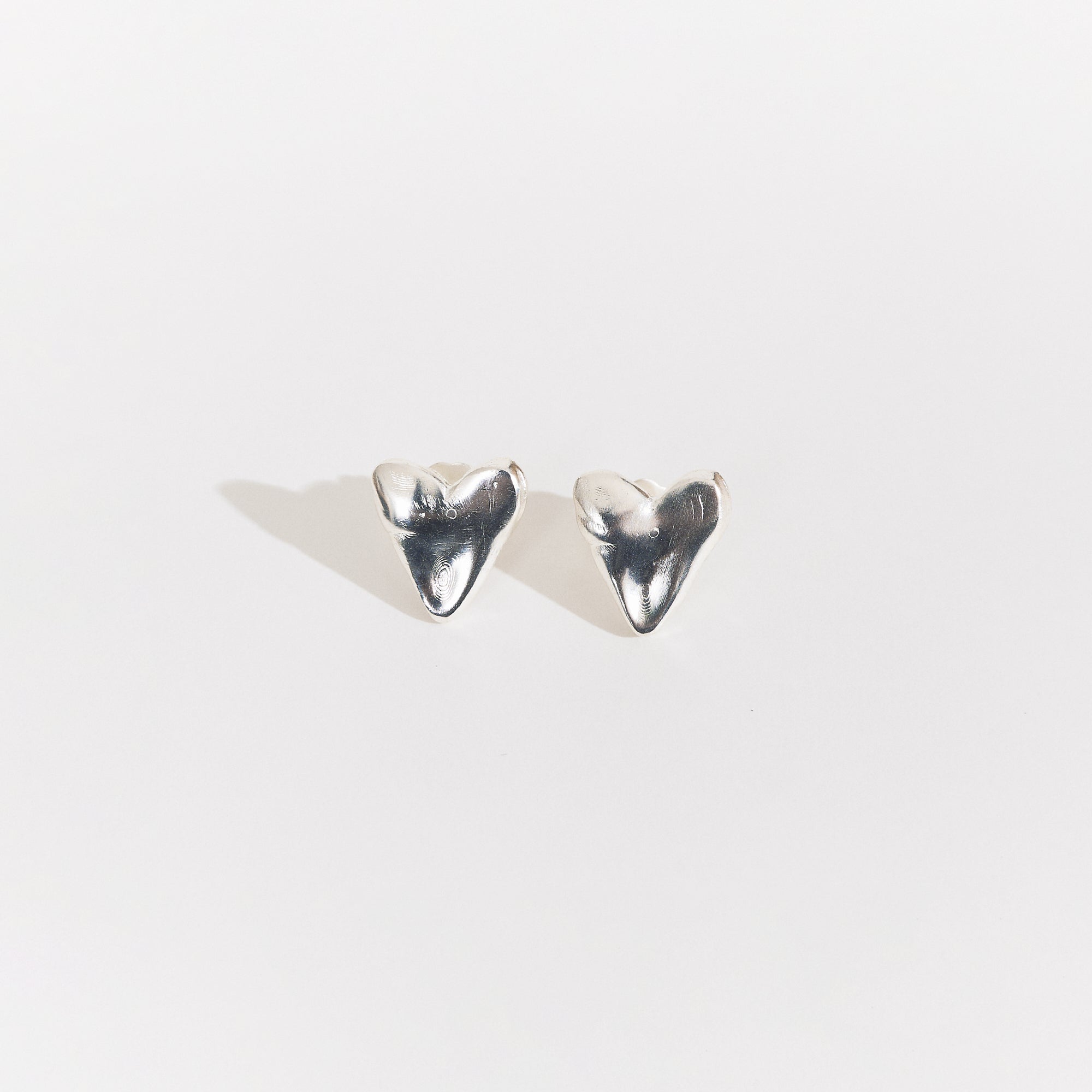 Aretes Un amor mini plateado