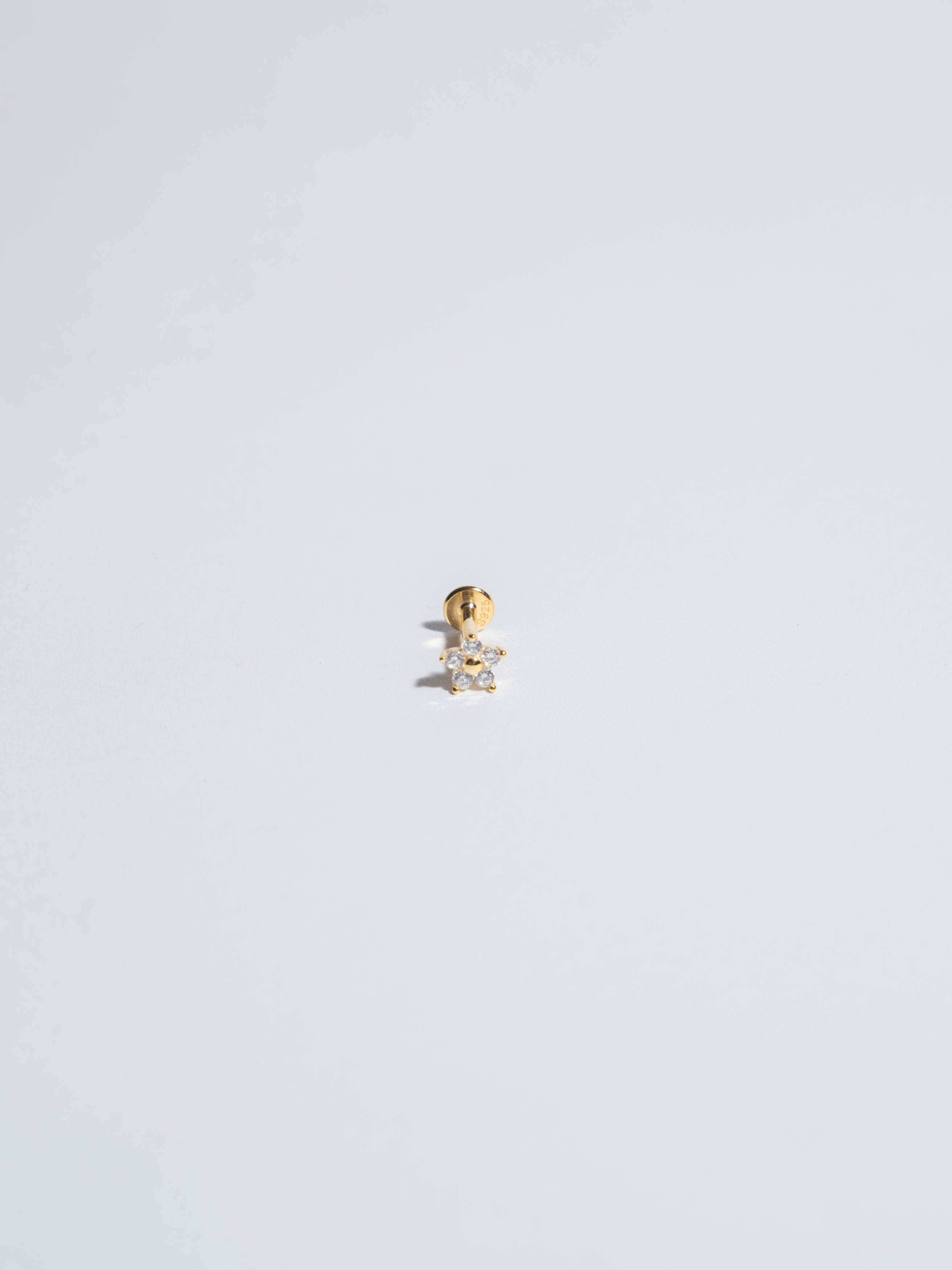 Piercing Flor Iris Transparente